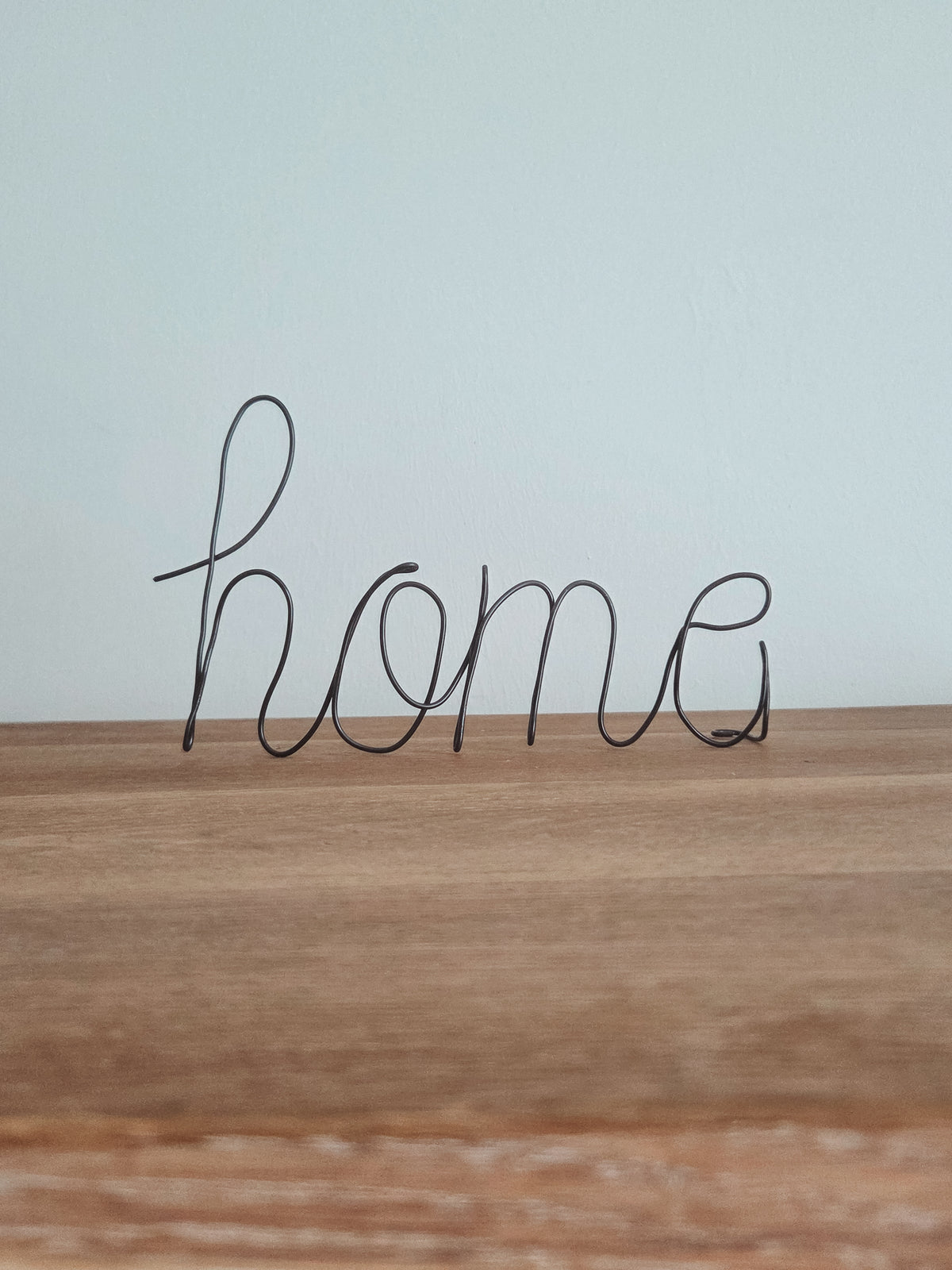 Draadwoord "home" zwart